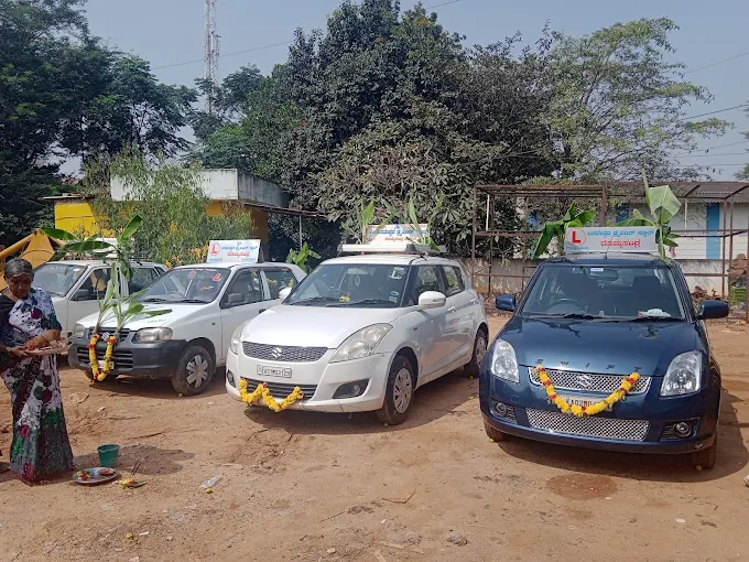 Sri Basaveshwara Driving School training cars with learner plates